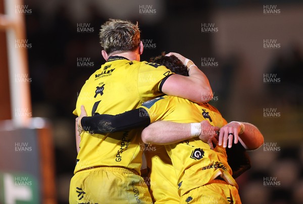 201225 - Dragons RFC v Connacht - United Rugby Championship - Che Hope of Dragons celebrates scoring a try with team mates