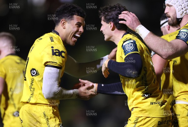 201225 - Dragons RFC v Connacht - United Rugby Championship - Che Hope of Dragons celebrates scoring a try with team mates