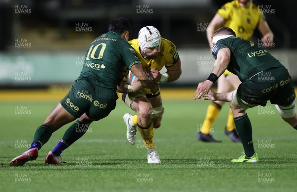 201225 - Dragons RFC v Connacht - United Rugby Championship - Harrison Keddie of Dragons is tackled by Josh Ioane of Connacht 