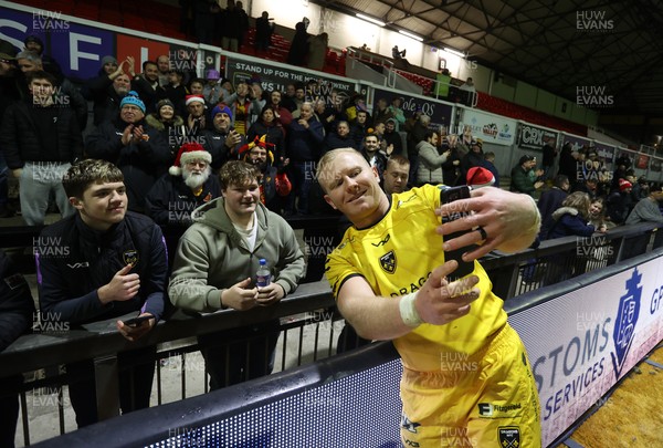 201225 - Dragons RFC v Connacht - United Rugby Championship - Tinus de Beer of Dragons with fans at full time