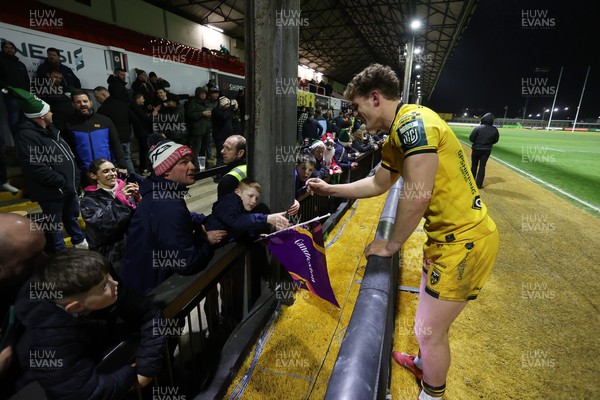 201225 - Dragons RFC v Connacht - United Rugby Championship - Joe Westwood of Dragons with fans at full time