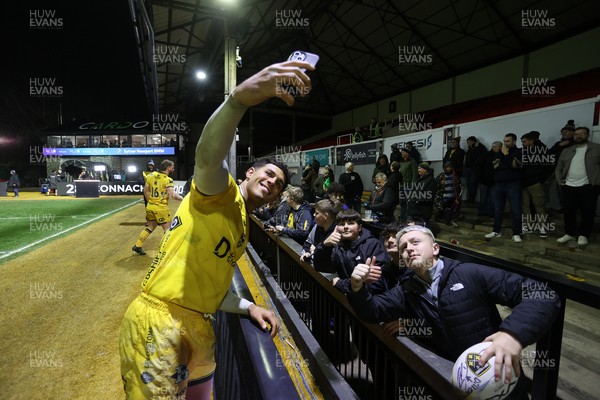 201225 - Dragons RFC v Connacht - United Rugby Championship - Rio Dyer of Dragons with fans at full time