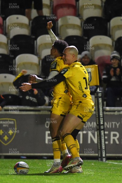 201225 - Dragons RFC v Connacht - United Rugby Championship - Rio Dyer of Dragons celebrates scoring a try with team mates