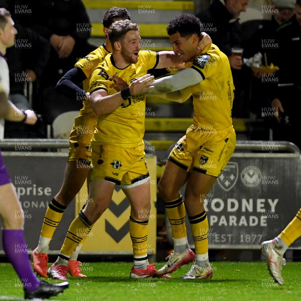 201225 - Dragons RFC v Connacht - United Rugby Championship - Rio Dyer of Dragons celebrates scoring a try with team mates