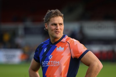 090526 - Dragons RFC v Edinburgh Rugby - United Rugby Championship - Duhan van der Merwe of Edinburgh warms up before kick off