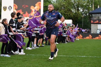 090526 - Dragons RFC v Edinburgh Rugby - United Rugby Championship - Pierre Schoeman of Edinburgh runs out for his 150th cap at the start of the match