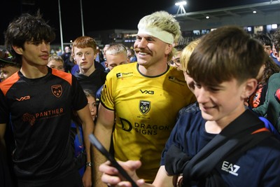 090526 - Dragons RFC v Edinburgh Rugby - United Rugby Championship - Aaron Wainwright of Dragons at full time with fans