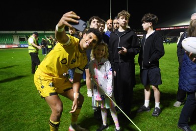 090526 - Dragons RFC v Edinburgh Rugby - United Rugby Championship - Rio Dyer of Dragons with fans at full time