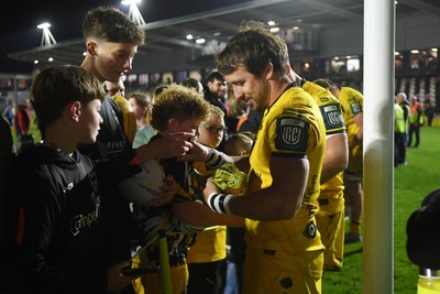 090526 - Dragons RFC v Edinburgh Rugby - United Rugby Championship - Rhodri Williams of Dragons with fans at full time