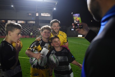 090526 - Dragons RFC v Edinburgh Rugby - United Rugby Championship - Angus O'Brien of Dragons with fans at full time
