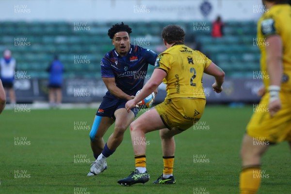090526 - Dragons RFC v Edinburgh Rugby - United Rugby Championship - Mosese Tuipulotu of Edinburgh takes on Brodie Coghlan of Dragons