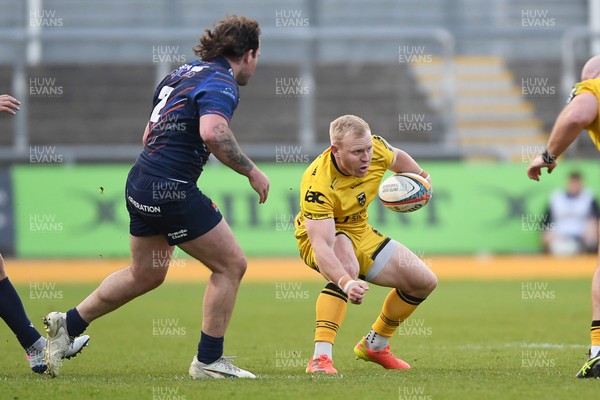 090526 - Dragons RFC v Edinburgh Rugby - United Rugby Championship - Tinus De Beer of Dragons is challenged by Ewan Ashman of Edinburgh