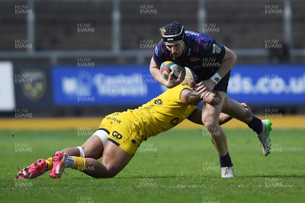 090526 - Dragons RFC v Edinburgh Rugby - United Rugby Championship - Harry Paterson of Edinburgh is challenged by Fine Inisi of Dragons