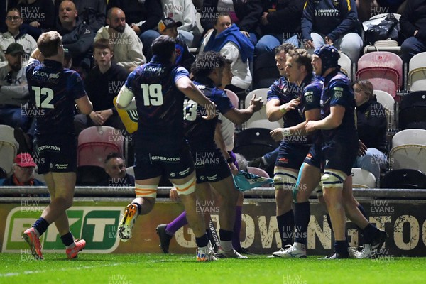 090526 - Dragons RFC v Edinburgh Rugby - United Rugby Championship - Duhan Van Der Merwe of Edinburgh celebrates scoring a try with team mates