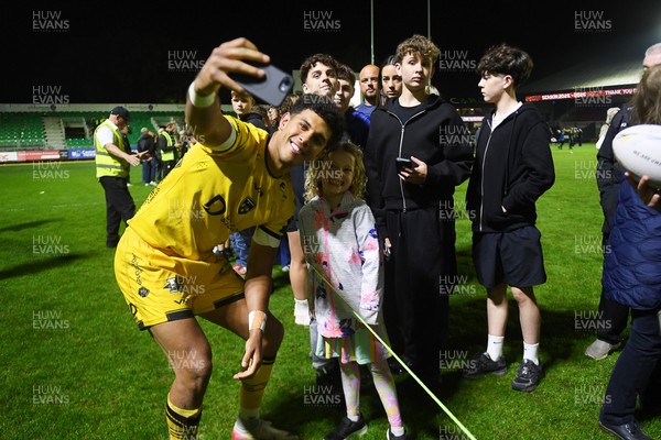 090526 - Dragons RFC v Edinburgh Rugby - United Rugby Championship - Rio Dyer of Dragons with fans at full time