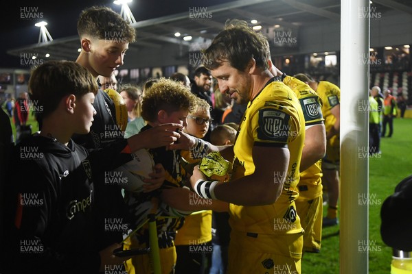 090526 - Dragons RFC v Edinburgh Rugby - United Rugby Championship - Rhodri Williams of Dragons with fans at full time