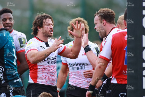 220123 - Dragons RFC v Emirates Lions - EPCR Challenge Cup - Players of Emirates Lions celebrate at the final whistle 