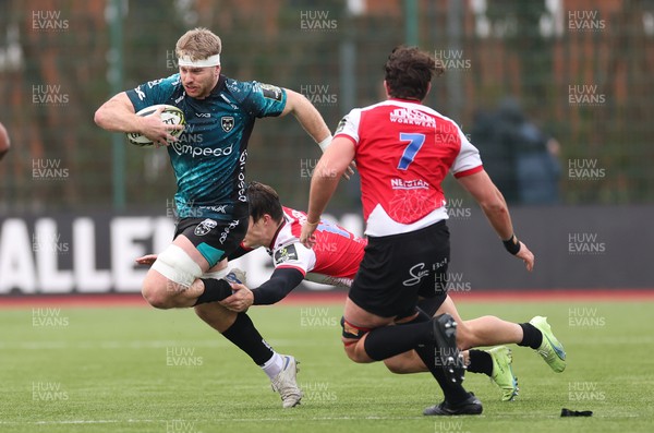 220123 - Dragons RFC v Emirates Lions, EPCR Challenge Cup - Aaron Wainwright of Dragons is tackled