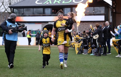 160225 - Dragons RFC v Glasgow Warriors - United Rugby Championship - James Benjamin of Dragons runs out on his 100th appearance for the Dragons