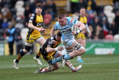 160225 - Dragons RFC v Glasgow Warriors - United Rugby Championship - Jack Mann of Glasgow is tackled by Dane Blacker of Dragons 