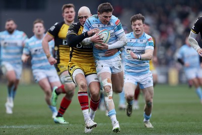 160225 - Dragons RFC v Glasgow Warriors - United Rugby Championship - Sebastian Cancelliere of Glasgow is tackled by Jared Rosser of Dragons 