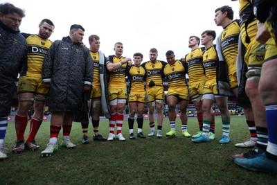 160225 - Dragons RFC v Glasgow Warriors - United Rugby Championship - Dragons team huddle at full time