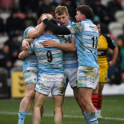 160225 - Dragons RFC v Glasgow Warriors - United Rugby Championship - George Horne of Glasgow Warriors celebrates scoring a try with team mates