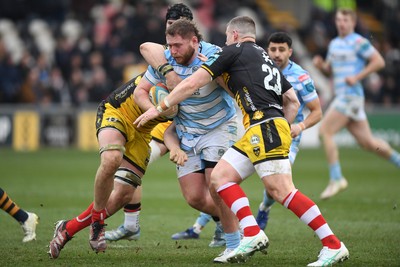 160225 - Dragons RFC v Glasgow Warriors - United Rugby Championship - Nathan McBeth of Glasgow Warriors is challenged by Scott Williams of Dragons