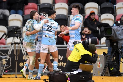 160225 - Dragons RFC v Glasgow Warriors - United Rugby Championship - Sebastian Cancellere of Glasgow Warriors celebrates scoring a try with team mates