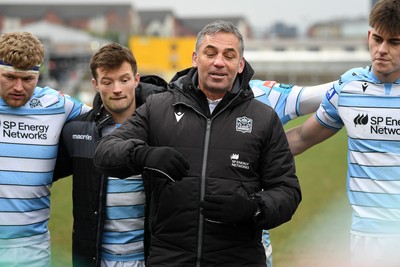 160225 - Dragons RFC v Glasgow Warriors - United Rugby Championship - Franco Smith, Glasgow Warriors Head Coach leads his sides huddle at full time