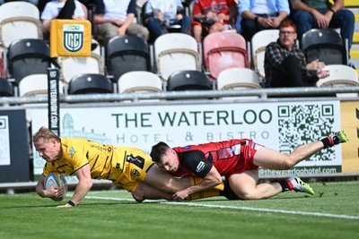 050926 - Dragons RFC v Hartpury, Preseason Friendly - David Richards of Dragons runs in to score a try