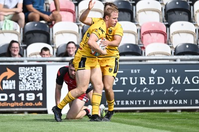 050926 - Dragons RFC v Hartpury, Preseason Friendly - David Richards of Dragons celebrates scoring a try