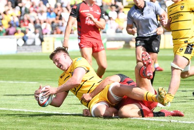 050926 - Dragons RFC v Hartpury, Preseason Friendly - Barny Langton-Cryer of Dragons scores a try