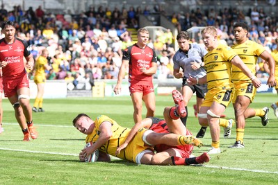 050926 - Dragons RFC v Hartpury, Preseason Friendly - Barny Langton-Cryer of Dragons scores a try