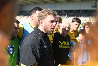 050926 - Dragons RFC v Hartpury, Preseason Friendly - Angus O’Brien of Dragons leads the team huddle at full time