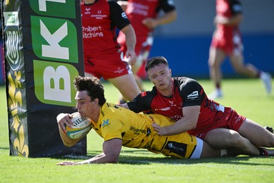 050926 - Dragons RFC v Hartpury, Preseason Friendly - Brogan Leary of Dragons scores a try