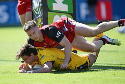 050926 - Dragons RFC v Hartpury, Preseason Friendly - Brogan Leary of Dragons scores a try