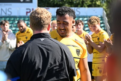 050926 - Dragons RFC v Hartpury, Preseason Friendly - Angus O’Brien of Dragons with Carwyn Tuipulotu of Dragons after he plays his last match for the club