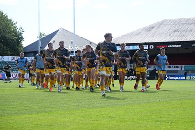050926 - Dragons RFC v Hartpury, Preseason Friendly - Dragons run towards supporters after the warmup
