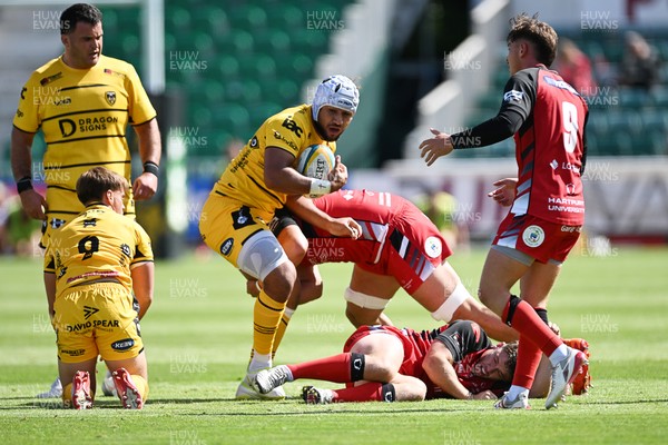 050926 - Dragons RFC v Hartpury, Preseason Friendly - Anzelo Tu’itavuki of Dragons is challenged by Sam Alford of Hartpury