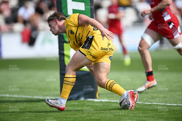 050926 - Dragons RFC v Hartpury, Preseason Friendly - Morgan Lloyd of Dragons scores a try