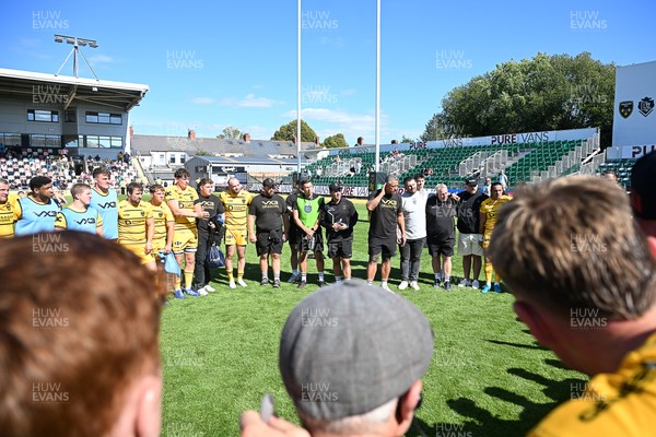 050926 - Dragons RFC v Hartpury, Preseason Friendly - Dragons huddle at full time