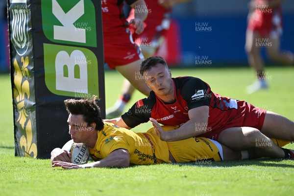 050926 - Dragons RFC v Hartpury, Preseason Friendly - Brogan Leary of Dragons scores a try