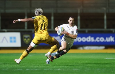 031025 - Dragons RFC v Hollywoodbets Sharks, United Rugby Championship - Jean Smith of Hollywoodbets Sharks takes on Fine Inisi of Dragons