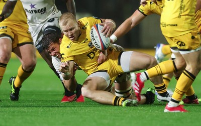 031025 - Dragons RFC v Hollywoodbets Sharks, United Rugby Championship - Tinus de Beer of Dragons is tackled