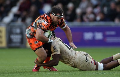 141225 - Dragons RFC v Lyon Olympique Universitaire - European Rugby Challenge Cup - Robert Hunt of Dragons is tackled by Marvin Okuya of Lyon 