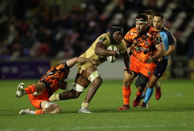 141225 - Dragons RFC v Lyon Olympique Universitaire - European Rugby Challenge Cup - Marvin Okuya of Lyon is tackled by Thomas Young of Dragons 