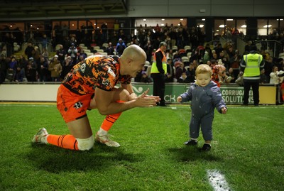 141225 - Dragons RFC v Lyon Olympique Universitaire - European Rugby Challenge Cup - Jared Rosser of Dragons with family at full time