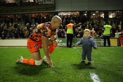 141225 - Dragons RFC v Lyon Olympique Universitaire - European Rugby Challenge Cup - Jared Rosser of Dragons with family at full time