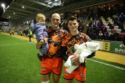 141225 - Dragons RFC v Lyon Olympique Universitaire - European Rugby Challenge Cup - Jared Rosser and Ewan Rosser of Dragons with family at full time
